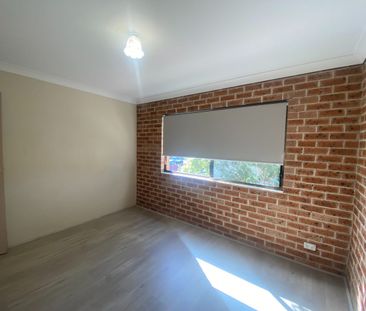 Spacious Two Bedroom Unit Offering Easy Living and Great Value! - Photo 5