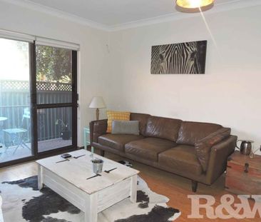 SPACIOUS TWO BEDROOM UNIT WITH COURTYARD - Photo 4
