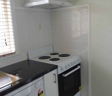 Elevated Three Bedroom Home with Garage and Outdoor Living - Photo 1