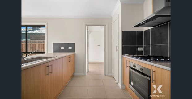 Modern Four-Bedroom Family Home with Ensuite and Double Garage - Photo 1