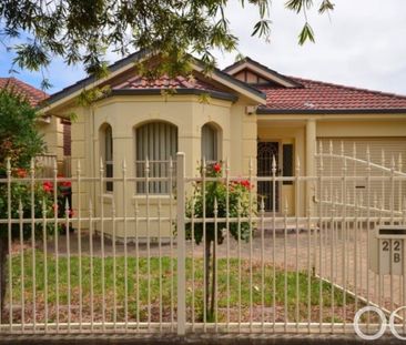 Open the Door to Peaceful living and Convenience - Photo 1