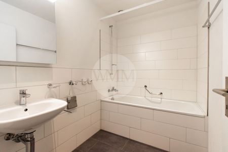 TWO-ROOM APARTMENT IN MINERGIE BUILDING IN CHIASSO NEAR THE STATION - Photo 4