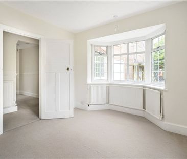 A detached two storey 1930's house with integral single garage situ... - Photo 1
