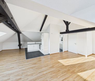 Charmante 1.5-Zimmer-Dachwohnung im Herzen von St. Gallen - Photo 1