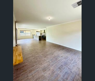 Spacious 4-Bedroom Home with Theatre, Study & Easy-Care Gardens - Photo 1