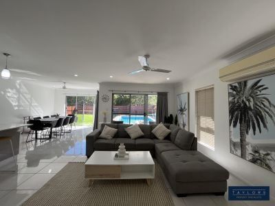 Spacious Family Living with Pool & Double Garage - Photo 3