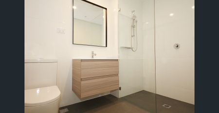 Nearly New Larger one bedroom plus study with sunny balcony - Photo 2