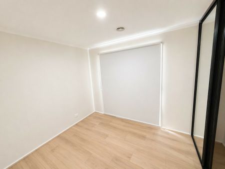 Freshly Updated Family Home with Flexible Living & Secure Parking - Photo 4