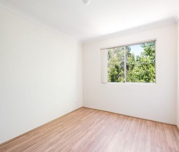 Neat and Tidy two-bedroom unit with parking - Photo 4