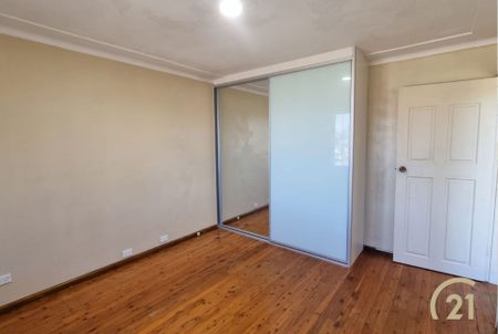 Well-Kept Family Home in a Convenient Location! - Photo 4