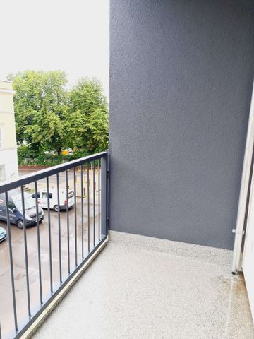 hochwertig ausgestattet * Fußbodenheizung * Balkon * Wanne+Dusche* Designbelag - Foto 4