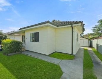 Updated Four Bedroom Home with Ample Yard & Garden - Photo 1