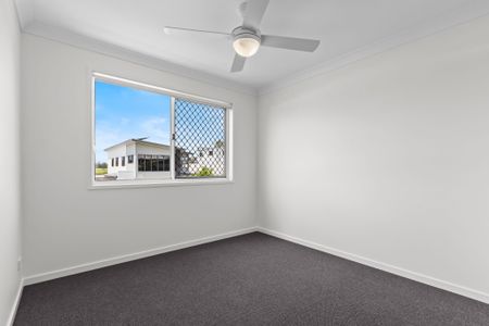 BRAND NEW four bedroom home with two living areas and solar panels! - Photo 2