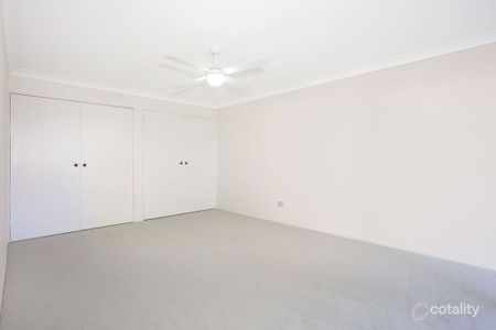 Spacious Townhouse with Solar and Water Included - Photo 3