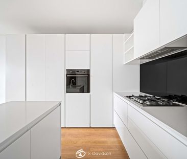 Stylish 1-Bedroom Unit with Balcony & City Views - Photo 2