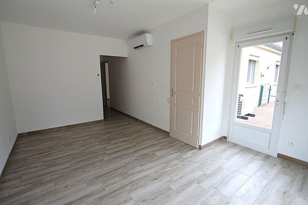 Au calme, proche place du marché et toutes commodités, sur son terrain de 778 m², maison de pla... - Photo 1