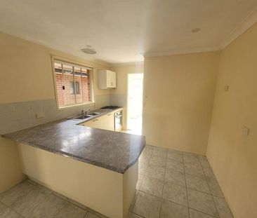 Well-Maintained 4 Bedroom Home - Photo 5