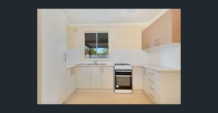 Neat and Tidy Three-Bedroom Home - Photo 5