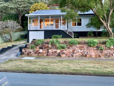 Renovated three bedroom home with single garage, where the back yard lawn is mowed for you and your pet may be welcome! - Photo 5