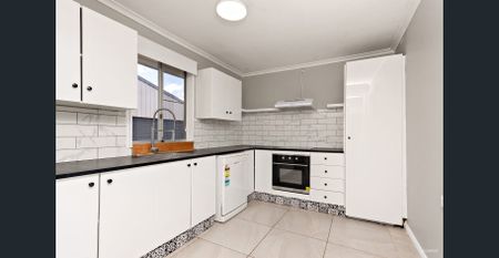 FRESHLY UPDATED FAMILY HOME WITH SOLAR & AIR-CON - Photo 5