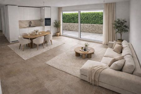 NEUBAU AN TOPLAGE MIT GROSSZÜGIGEM SITZPLATZ (40 M²) SOWIE EIGENER WASCHKÜCHE UND KELLER (17,4 M²). THE APARTMENT CAN ALSO BE RENTED FURNISHED IF DESIRED. - Foto 2