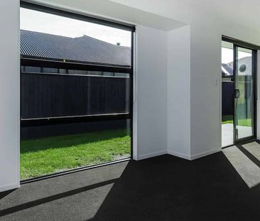 Modern 4-Bedroom Home Opposite Reserve in Lincoln - Photo 3