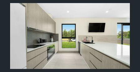 Within walking distance of local shops, schools, and public transport! - Photo 3