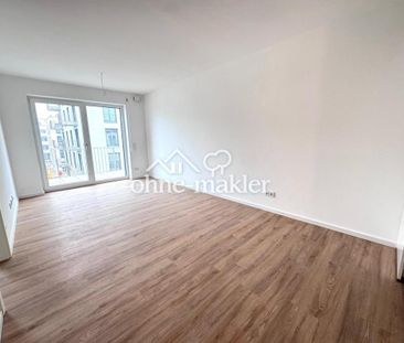 Lichtdurchflutete 2-Zimmer Wohnung mit Einbauküche und Balkon! NEUBAU - Photo 1