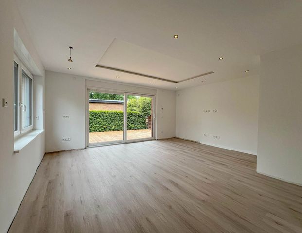 6570 - Großzügige und helle EG-Wohnung mit großer Terrasse, Garten und Garage! - Photo 1