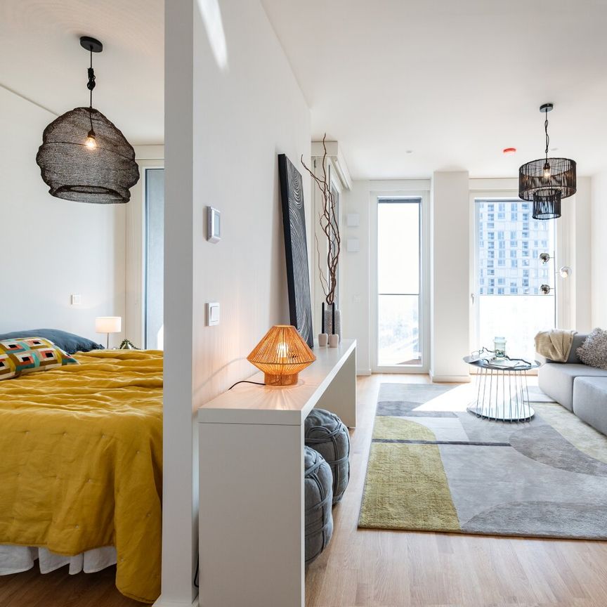 Wohnen mit Skyline-Flair – Rooftop Pool & Fitness bei der U1 - Photo 1