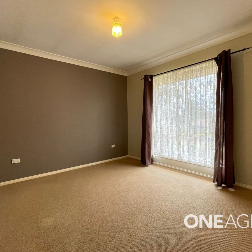 NEAT 3-BEDROOM HOME WALKING DISTANCE TO THE WATER - Photo 1