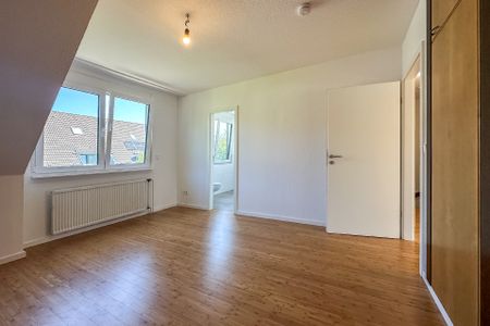 Familienfreundliches Wohnen nah am Zentrum – gepflegtes Reihenmittelhaus mit Garten und Garage - Photo 2