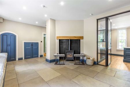 This magnificent Edwardian house sits within 0.9 of an acre of beautiful landscaped gardens with a 16th Century Grade II* listed Conduit House in the garden. - Photo 3