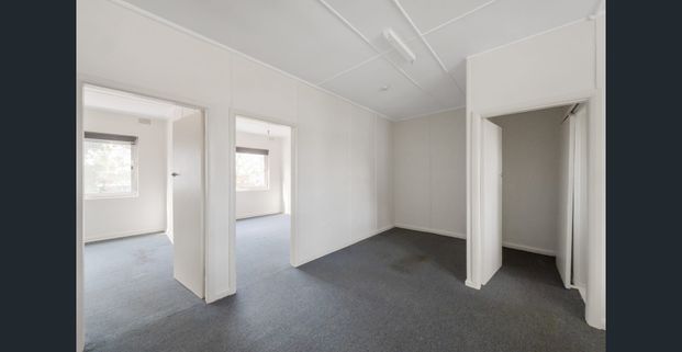 Located above the takeaway shop - For Inspections walk down the driveway, turn left and up the stairs to flat 2 - Photo 1