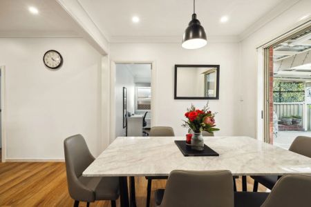 Stylishly updated north-to-rear facing home set on a tree-lined street - Photo 4