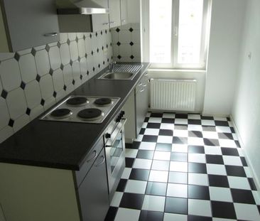 Sanierte 2-Zimmerwohnung mit EBK und Parkettfußboden! - Foto 1