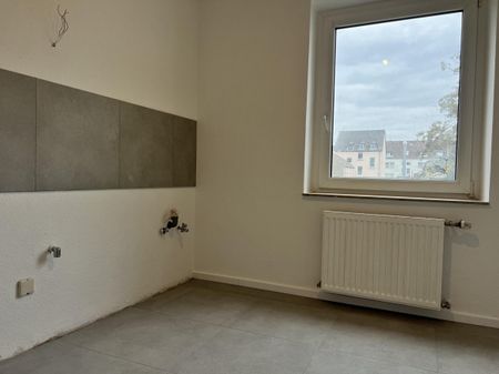 Renovierte 2-Zimmer-Wohnung mit Balkon, Keller und Gartennutzung - Foto 4