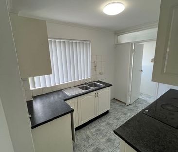 Fresh & Convenient 2-Bedroom Unit with Lock-Up Garage - Photo 5