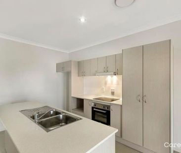 Modern 3-Bedroom Unit in Tranquil Mount Low - Photo 2