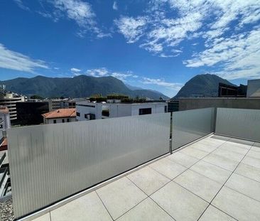 EXCLUSIVE PENTHOUSE WITH PRESTIGIOUS FINISHES IN THE HEART OF LUGANO - Photo 4