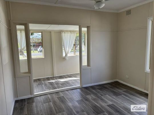 Long-Term 2-Bedroom Rental with Secure Fenced Yard - Photo 1