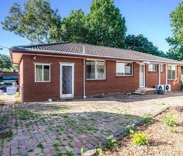 Charming Family Home with Spacious Layout & Low-Maintenance Yard - Photo 2