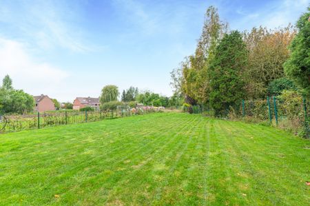 Halfopen woning met 4 slaapkamers en grote tuin! - Photo 2