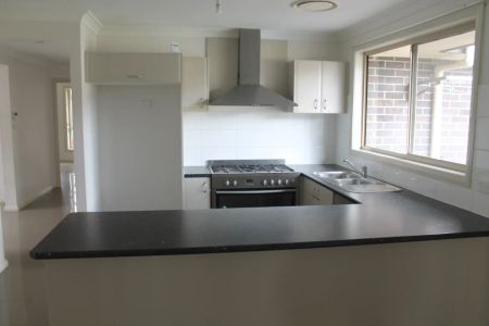 Spacious & Practical Family Home in a Prime Oran Park Location - Photo 3