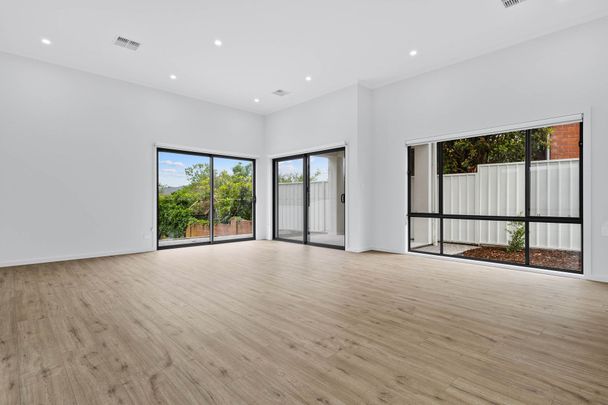 Stylish Family Living with Hills Views in Windsor Gardens - Photo 1