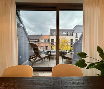 Ruim appartement met 2 slaapkamers, 2 terrassen en garagebpx - Photo 4