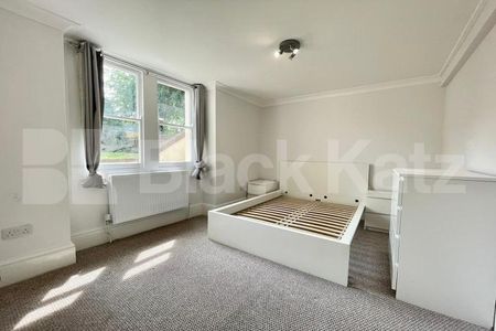 Spread over the ground floor of this stunning period building - Photo 4