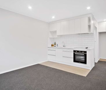 Cute two bedroom unit! - Photo 1