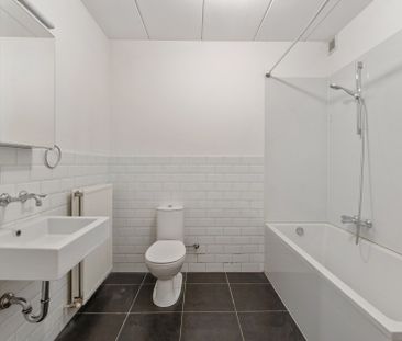 Gelijkvloers appartement met 1 à 2 slaapkamers, tuintje en garagebox - Photo 4