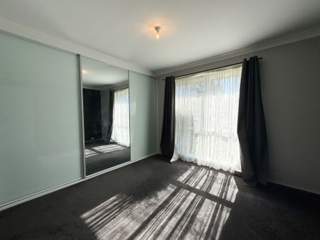 Peaceful Suburban Living in a Central, Well-Connected Location - Photo 4